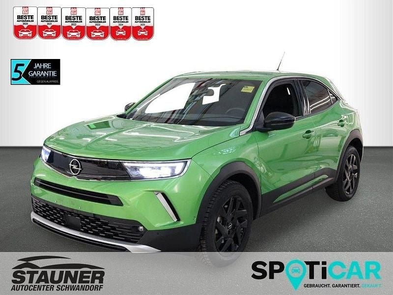 Grün Gebraucht 2023 Opel Mokka-e Elegance SUV | 17.980 € (Superpreis) - Bild 1/4