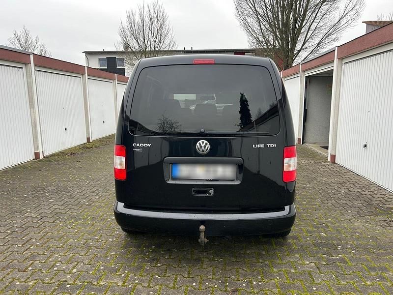 Gebraucht VW Caddy Team 105 PS (77 kW) 2010 Schwarz Van / Kleinbus