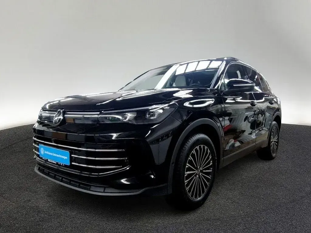 Gebraucht VW Tiguan Elegance 272 PS (200 kW) 2025 0e grenadillschwarz metallic SUV