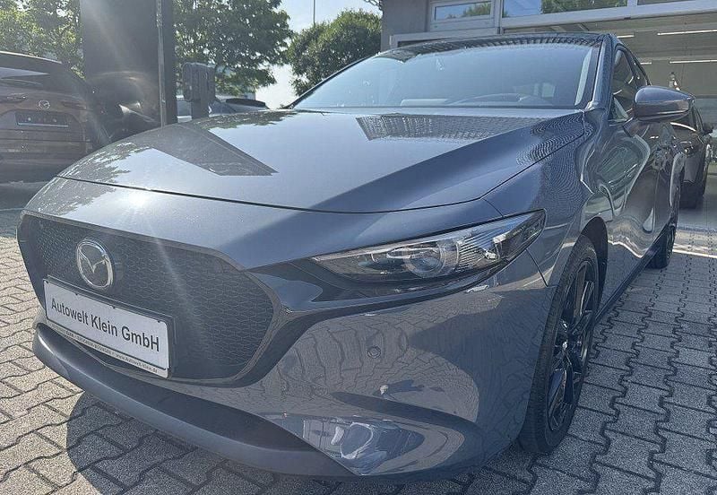 Polymetal grau Gebraucht 2021 Mazda 3 Selection Limousine | 22.900 € (Fairer Preis) - Bild 1/4
