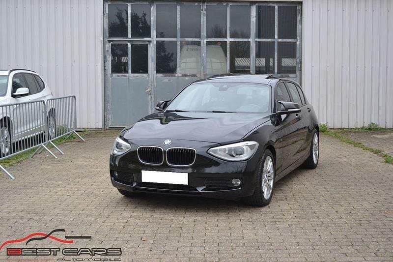 Schwarz Gebraucht 2011 BMW 120 Comfort Edition Kleinwagen | 8.950 € (Teuer) - Bild 1/4