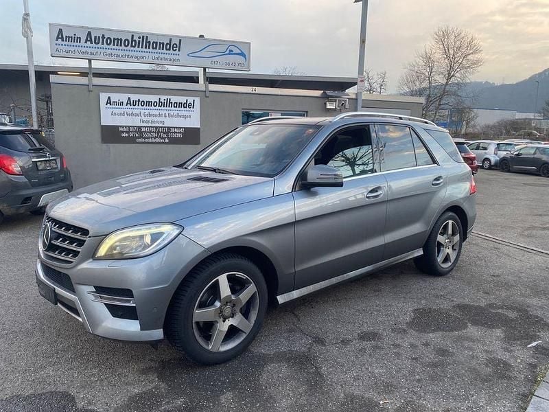 Grau Gebraucht 2013 Mercedes ML350 SUV | 12.990 € (Fairer Preis) - Bild 1/4