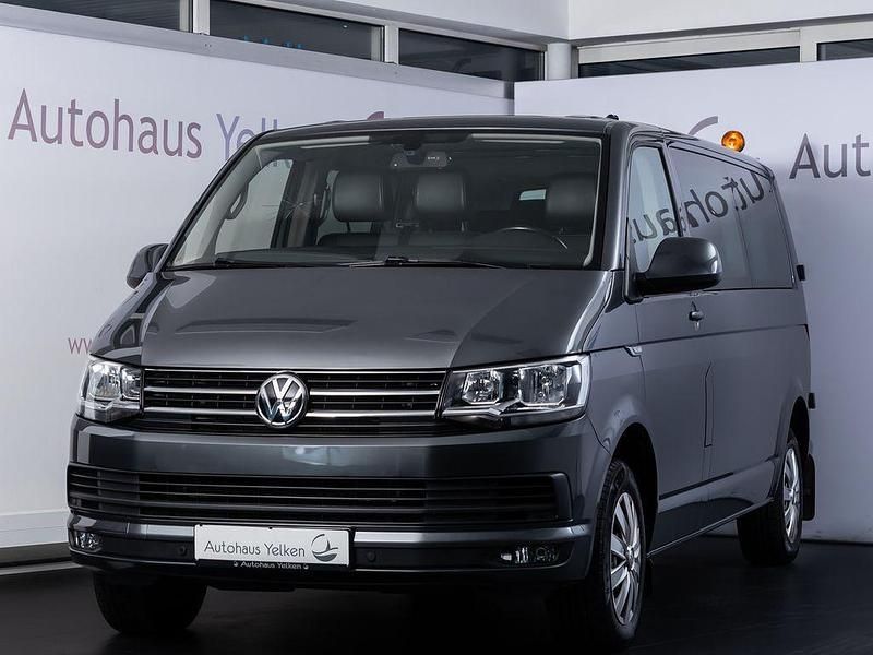 Grau Gebraucht 2018 VW Caravelle Comfortline Van / Kleinbus | 19.990 € (Superpreis) - Bild 1/4