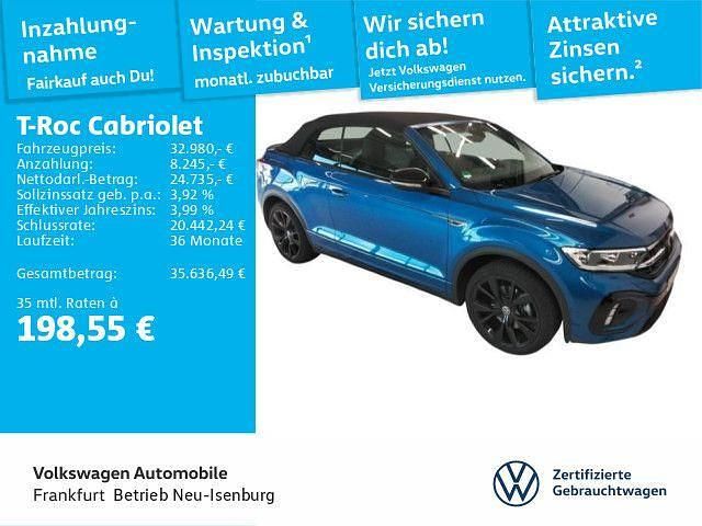 Ravennablau metallic/schwarz Gebraucht 2024 VW T-Roc Cabriolet R-line Cabrio | 32.980 € (Fairer Preis) - Bild 1/4