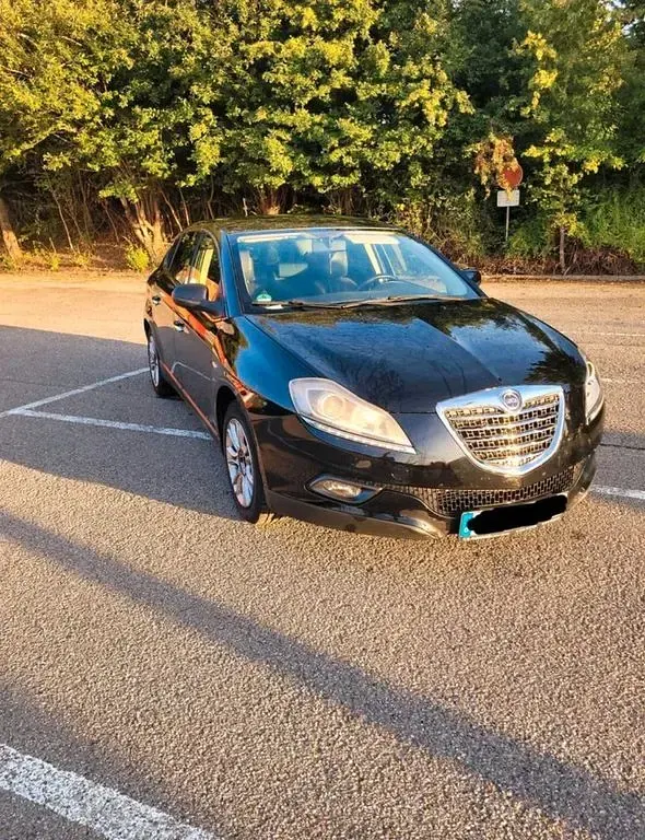 Gebraucht Lancia Delta 120 PS (88 kW) 2011 Schwarz Kleinwagen