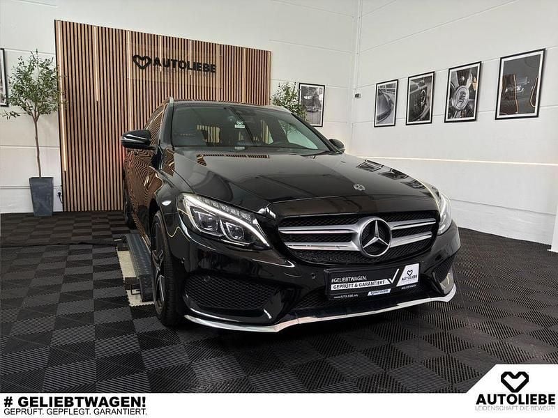Schwarz Gebraucht 2017 Mercedes C180 AMG line Limousine | 22.950 € (Fairer Preis) - Bild 1/4