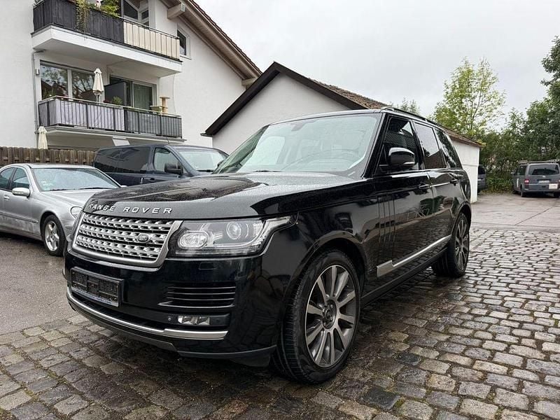 Santorini black Gebraucht 2014 Land Rover Range Rover Vogue SUV | 18.990 € - Bild 1/4