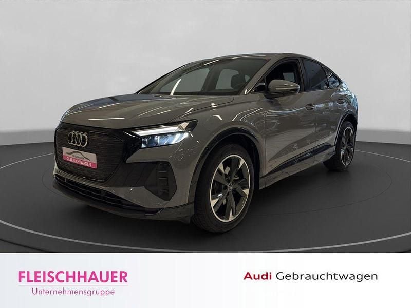 Grau Gebraucht 2022 Audi Q4 Sportback e-tron Advanced SUV | 25.980 € (Superpreis) - Bild 1/4