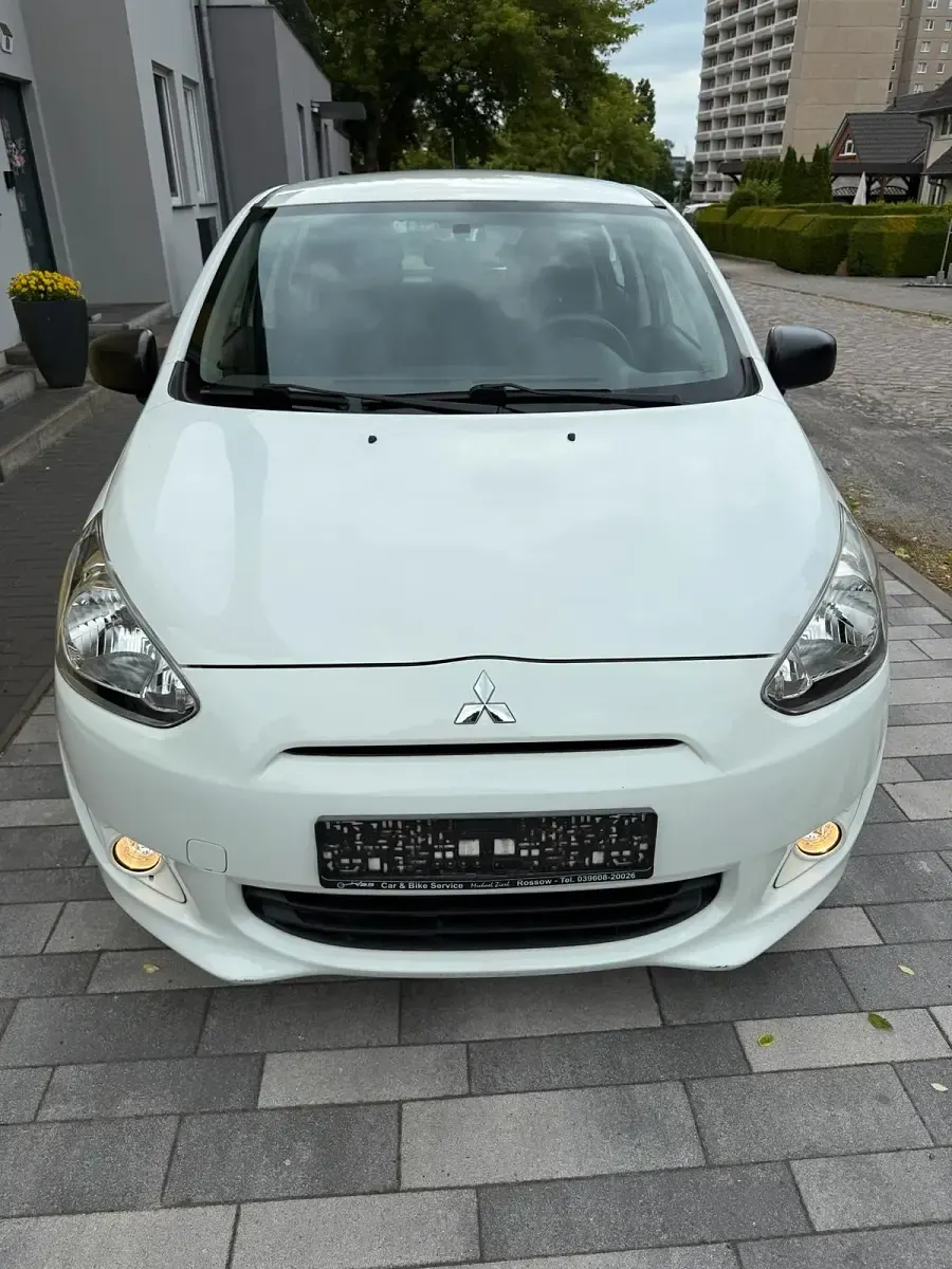 Gebraucht Mitsubishi Space Star 71 PS (52 kW) 2015 Weiß Kleinwagen