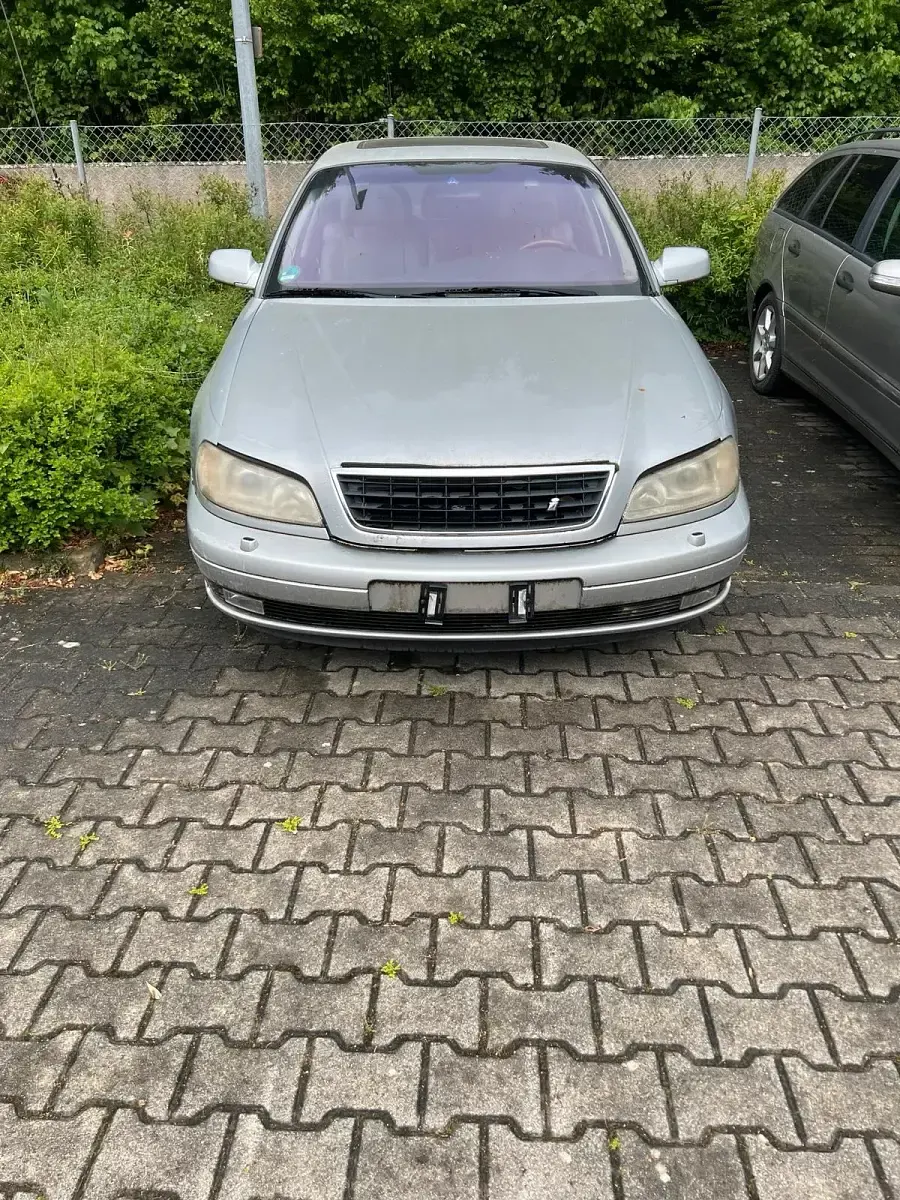 Używany Opel Omega 218 KM (160 kW) 1999 Srebrny Sedan/Limuzyna