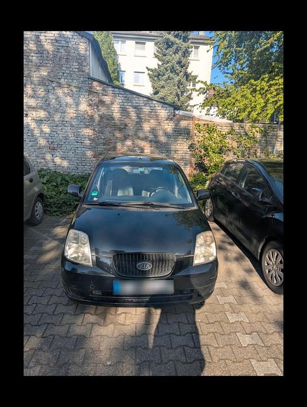 Second-hand Kia Picanto 65 CP (47 kW) 2005 Negru Hatchback