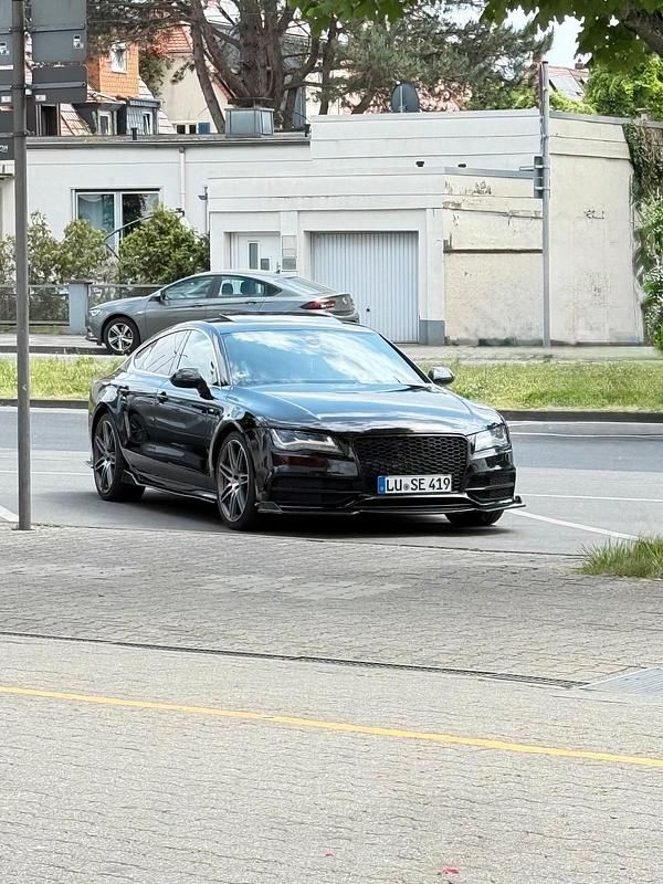 Schwarz Gebraucht 2011 Audi A7 Kleinwagen | 18.099 € (Teuer) - Bild 1/4