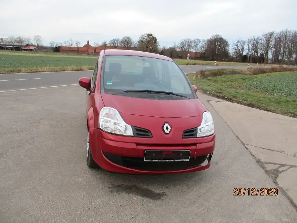 Używany Renault Modus 75 KM (55 kW) 2012 Czerwony Minivan