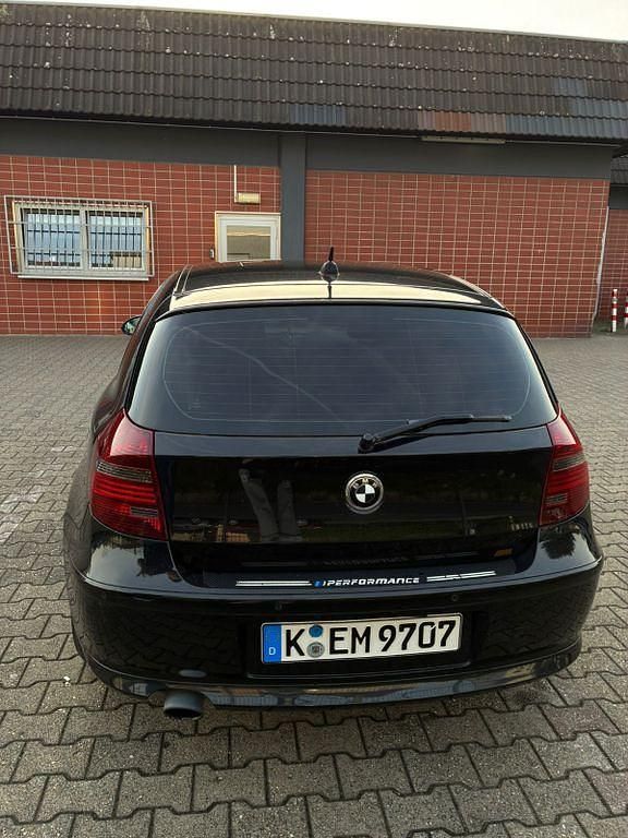 Second-hand BMW 116 122 CP (89 kW) 2008 Negru Hatchback