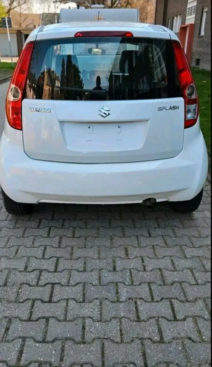Second-hand Suzuki Splash 77 CP (56 kW) 2011 Alb Hatchback