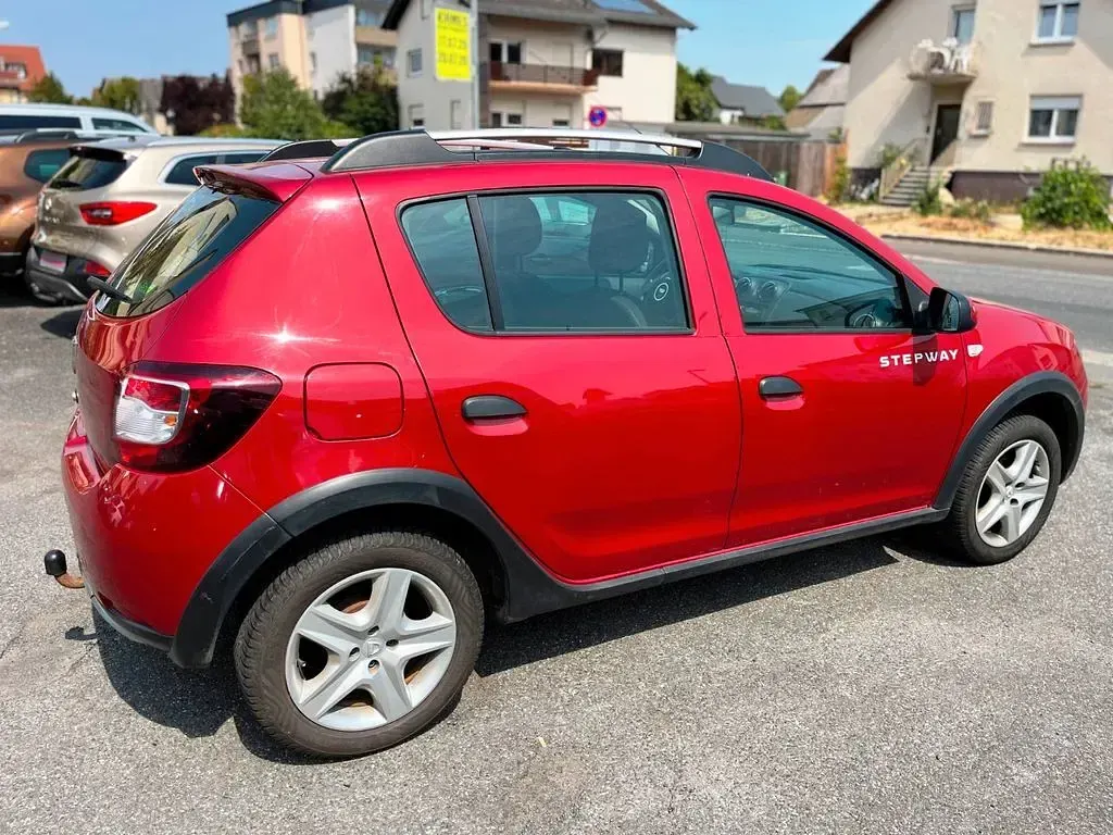 Gebraucht Dacia Sandero Stepway 90 PS (66 kW) 2014 Feuerrot SUV