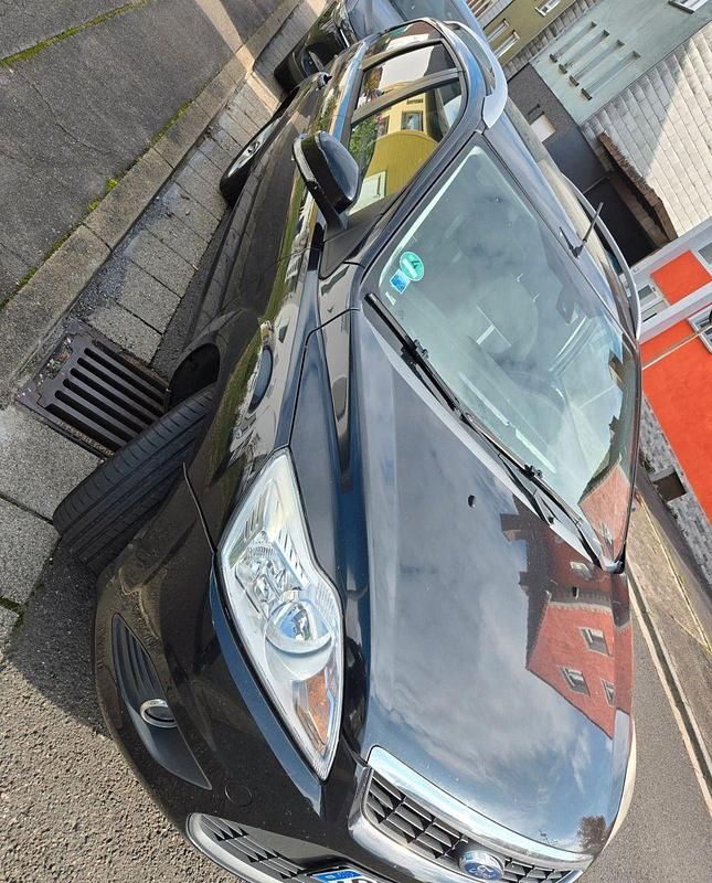 Schwarz Gebraucht 2011 Ford Focus Style Kombi | 2.599 € (Fairer Preis) - Bild 1/4