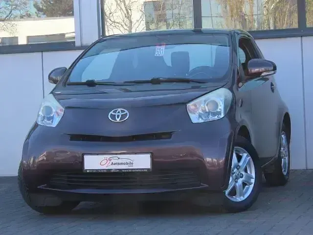 Używany Toyota iQ 68 KM (50 kW) 2009 Purpurowy Hatchback