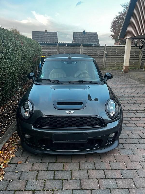 Schwarz Gebraucht 2012 Mini John Cooper Works Cabriolet Cabrio | 10.500 € (Fairer Preis) - Bild 1/4