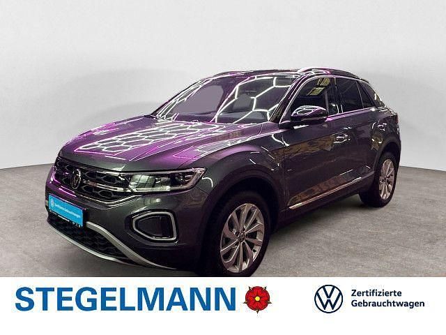 Grau Gebraucht 2024 VW T-Roc Style SUV | 26.890 € (Guter Preis) - Bild 1/4