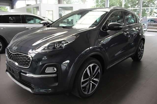 Grau metallic Gebraucht 2021 Kia Sportage Spirit SUV | 22.610 € (Etwas zu teuer) - Bild 1/4