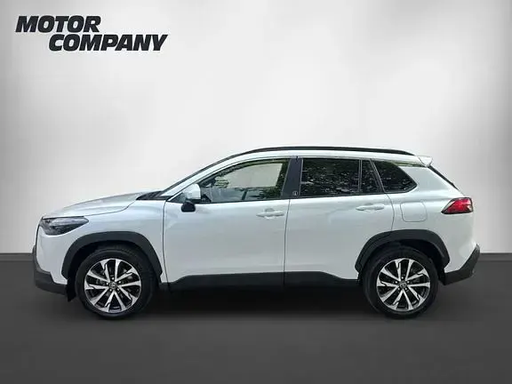 Gebraucht Toyota Corolla Cross Team 197 PS (144 kW) 2023 Platinumweiß perleffekt SUV