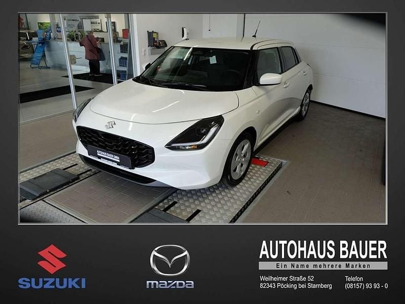 Pure white pearl met Neu 2025 Suzuki Swift Comfort Kleinwagen | 18.590 € - Bild 1/4