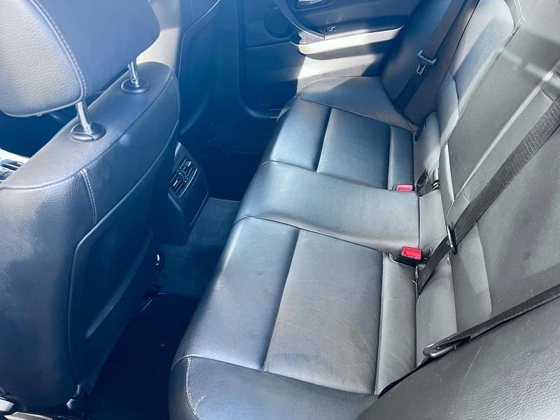 Gebraucht BMW 320 163 PS (119 kW) 2009 Schwarz Kombi