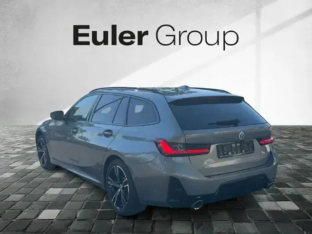 Gebraucht BMW 320e Performance 204 PS (150 kW) 2022 Grau Kombi
