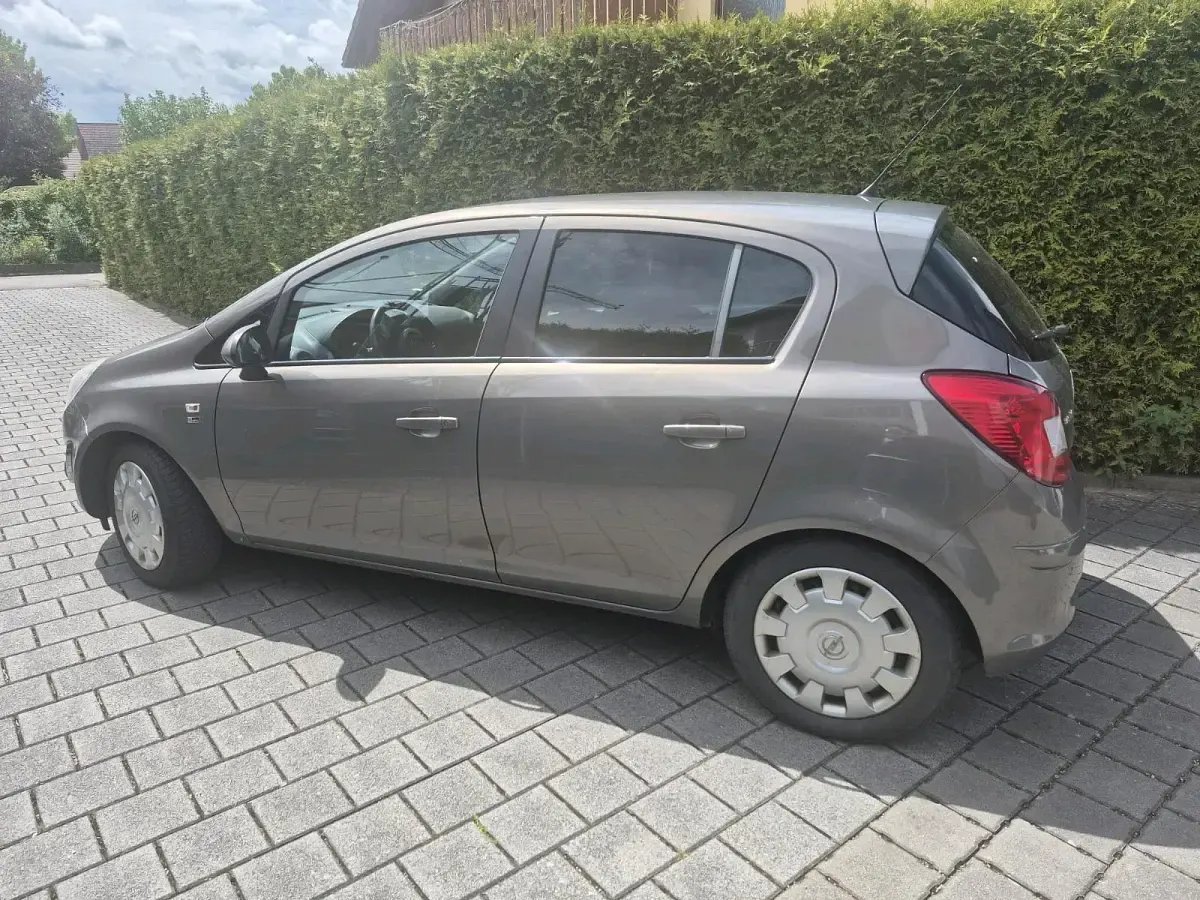Używany Opel Corsa 95 KM (69 kW) 2012 Szary Hatchback