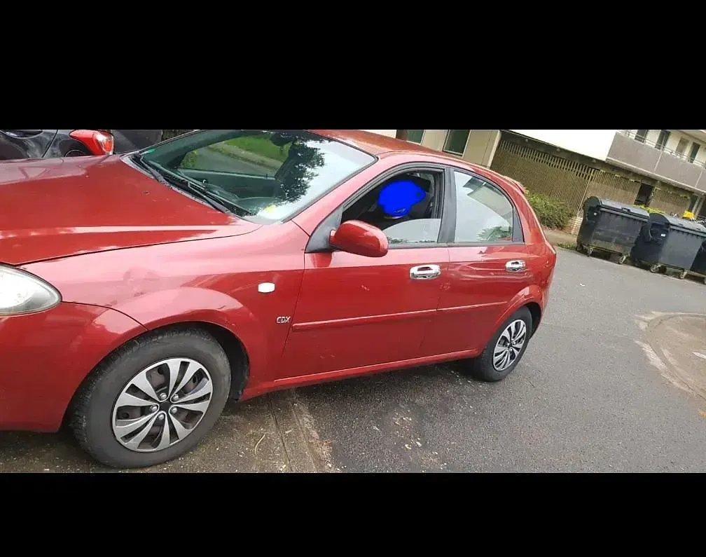Gebraucht Chevrolet Lacetti CDX 121 PS (88 kW) 2008 Rot Kleinwagen