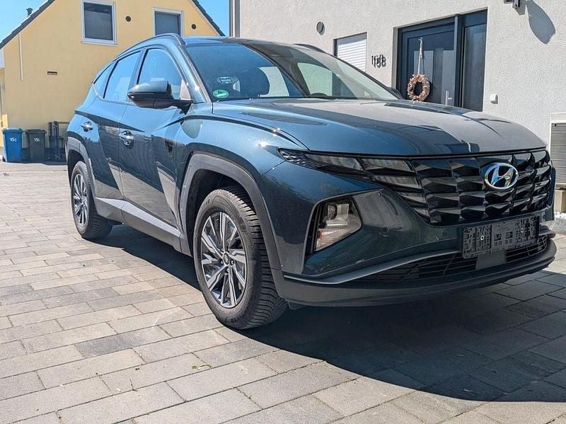 Blau Gebraucht 2023 Hyundai Tucson Select SUV | 22.999 € (Superpreis) - Bild 1/4