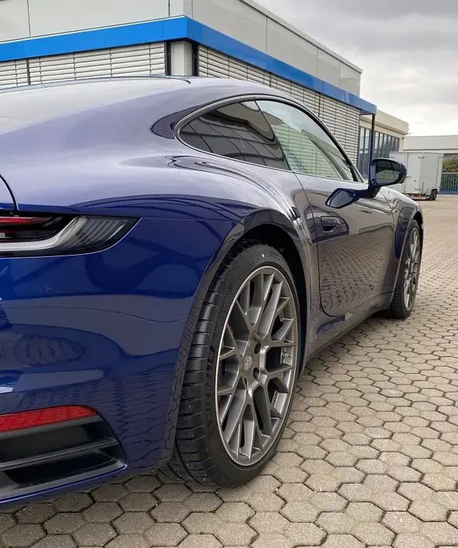 Gebraucht Porsche 911 Carrera 4 385 PS (283 kW) 2023 Blau Coupé