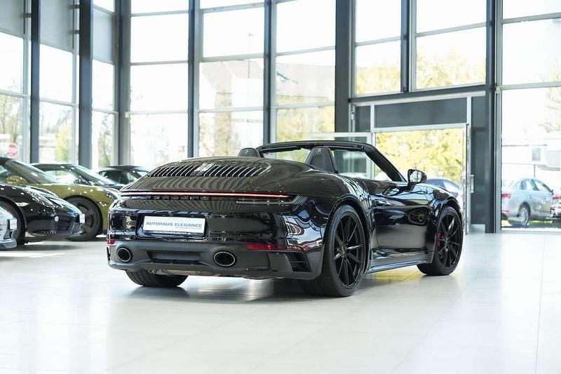 Gebraucht Porsche 911 Carrera Cabriolet 450 PS (330 kW) 2021 Tiefschwarzmetallic Cabrio