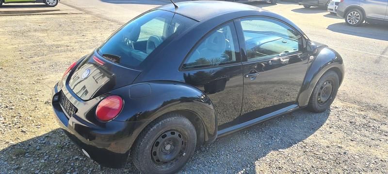 Gebraucht VW New Beetle 75 PS (55 kW) 2002 Schwarz Kleinwagen