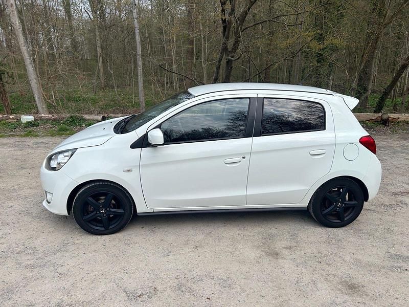 Gebraucht Mitsubishi Space Star 80 PS (58 kW) 2015 Weiß Limousine