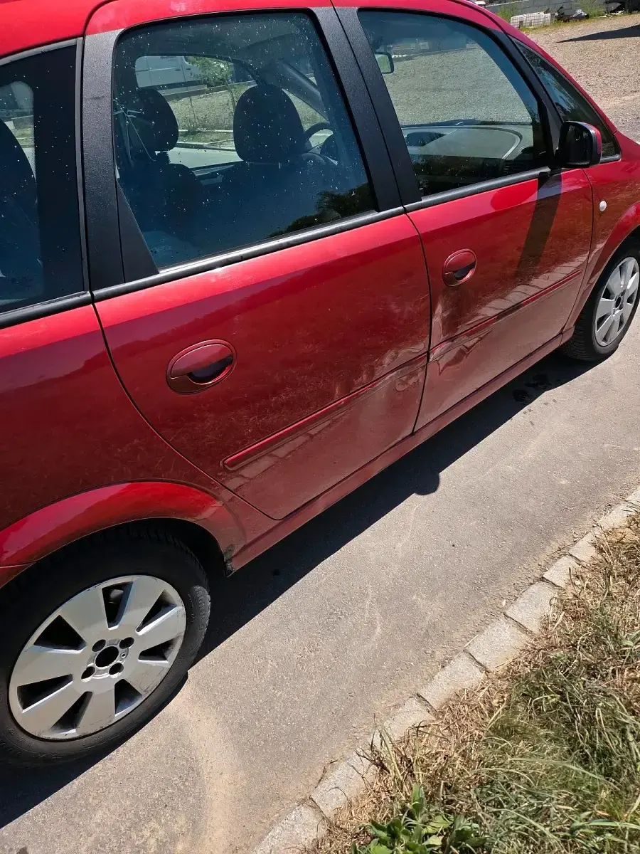 Second-hand Opel Meriva 105 CP (77 kW) 2006 Roșu Monovolum