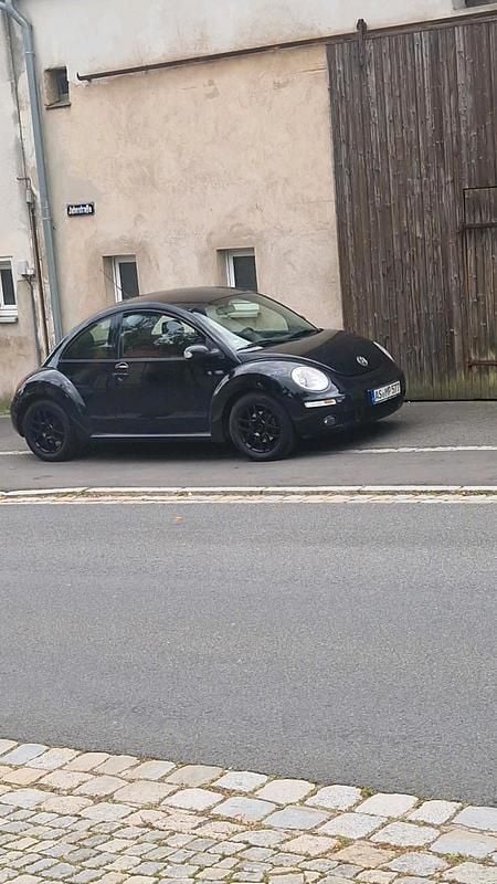 Gebraucht VW New Beetle 75 PS (55 kW) 2008 Schwarz Kleinwagen