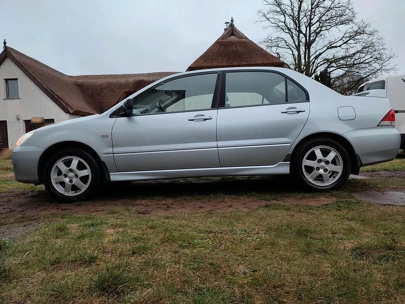Gebraucht Mitsubishi Lancer 98 PS (72 kW) 2004 Silber Limousine