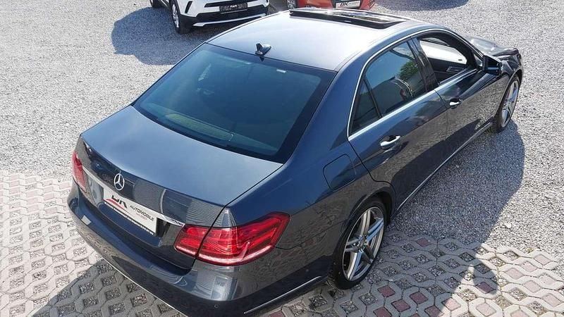 Używany Mercedes E400 333 KM (244 kW) 2014 Szary Sedan/Limuzyna