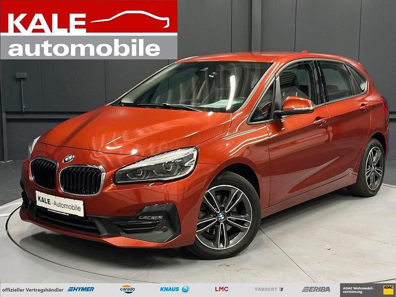Sunset orange metallic Gebraucht 2021 BMW 218 Active Tourer Sport Line Van / Kleinbus | 22.970 € (Fairer Preis) - Bild 1/4
