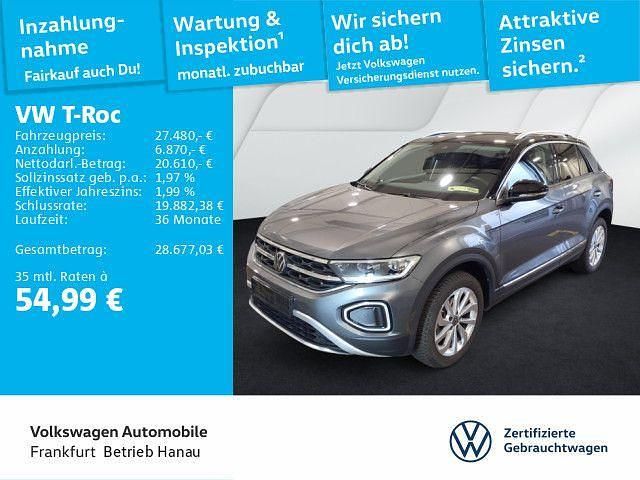 Indiumgrau metallic/schwarz Gebraucht 2024 VW T-Roc Style SUV | 27.480 € (Guter Preis) - Bild 1/4
