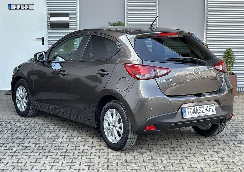 Gebraucht Mazda 2 Exclusive-Line 90 PS (66 kW) 2015 Braun Limousine
