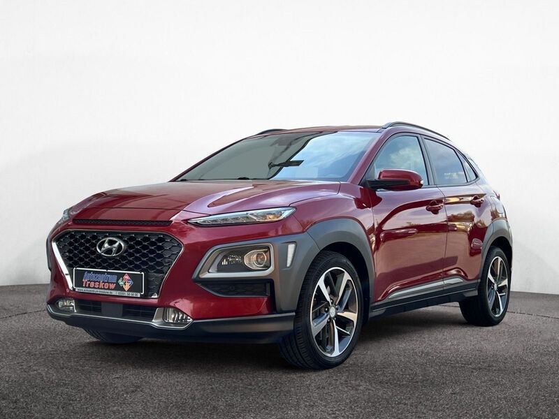 Pulse red / mic (metallic) Gebraucht 2018 Hyundai Kona Style SUV | 17.990 € (Fairer Preis) - Bild 1/4