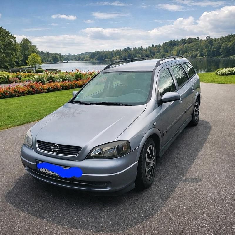 Andere farben Gebraucht 2004 Opel Astra Kombi | 999 € (Superpreis) - Bild 1/4