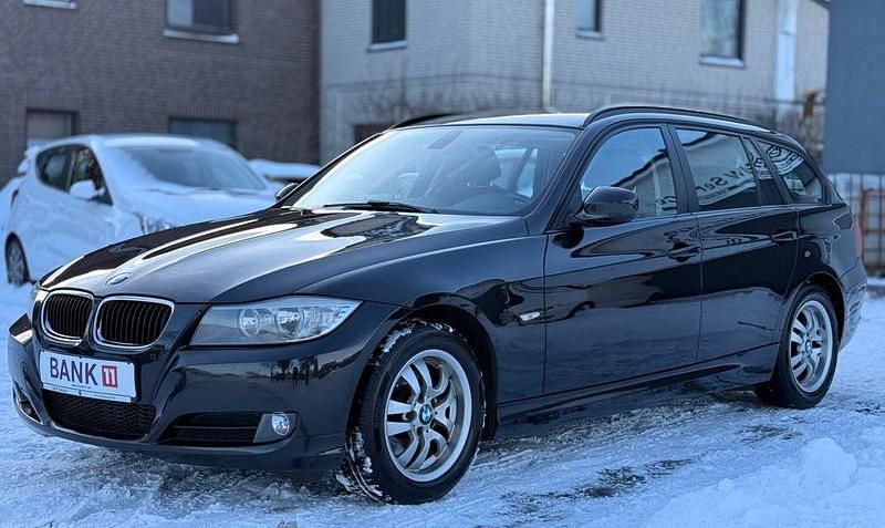 Schwarz Gebraucht 2011 BMW 316 Comfort Edition Kombi | 7.990 € - Bild 1/4