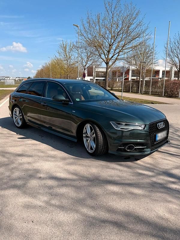 Second-hand Audi A6 Exclusive 320 CP (235 kW) 2018 Verde Break