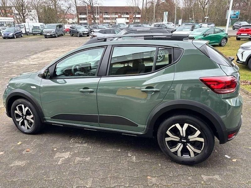 Gebraucht Dacia Sandero Expression 91 PS (66 kW) 2023 Safarigrau Limousine