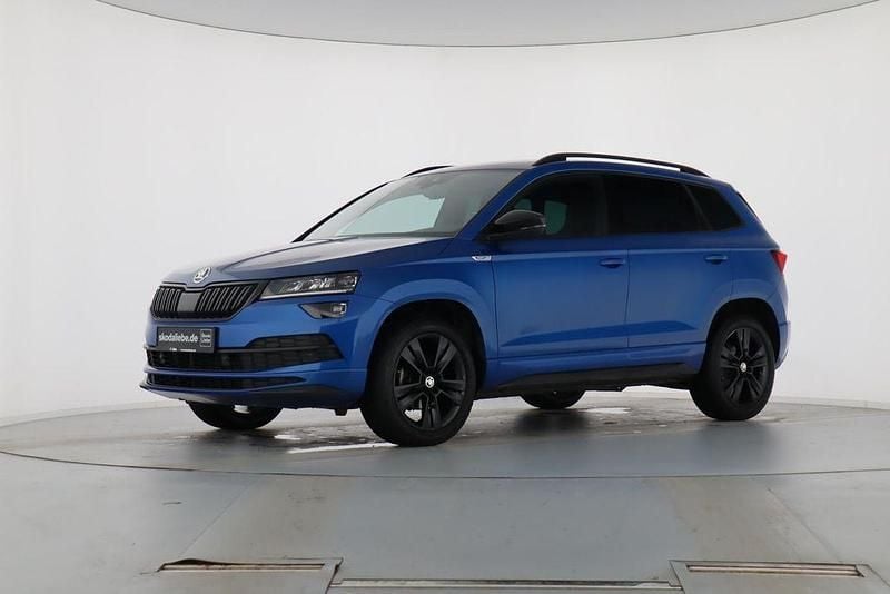 Raceblau metallic Gebraucht 2019 Skoda Karoq SportLine SUV | 24.889 € (Etwas zu teuer) - Bild 1/4