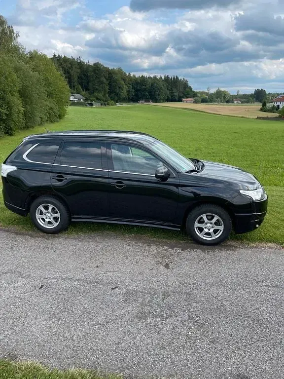 Gebraucht Mitsubishi Outlander 156 PS (114 kW) 2013 Schwarz SUV